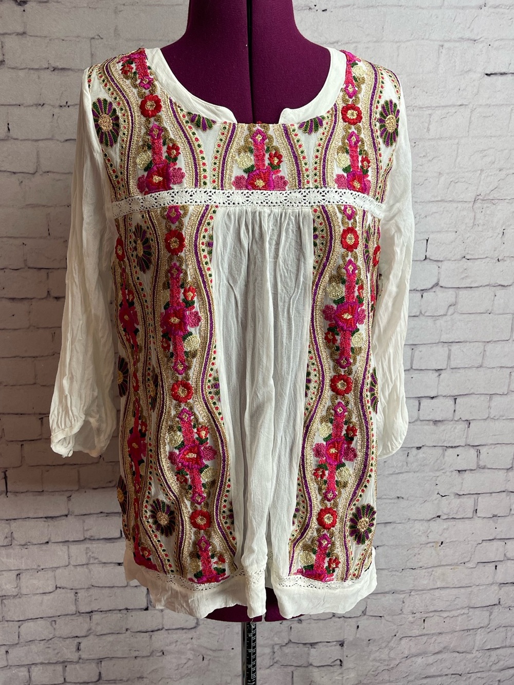 Anu size large cream colored blouse with colorful embroidery